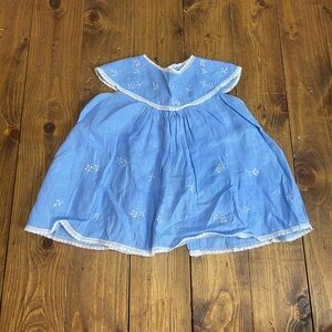 Vintage baby dress blue with white trim and white embroidered flowers